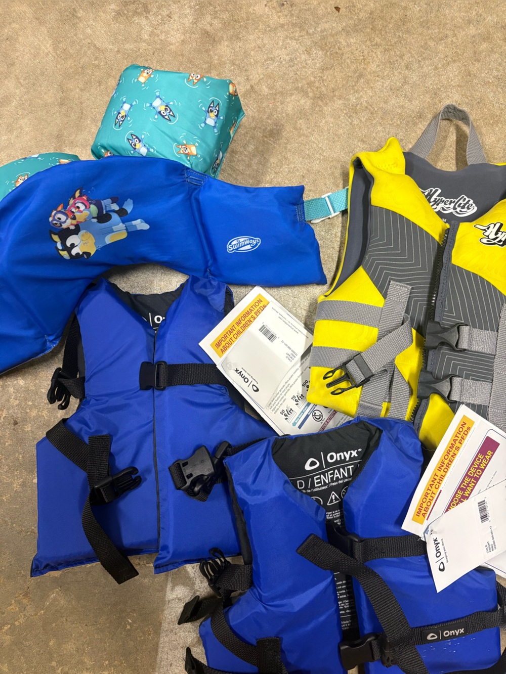 Onyx and hyperlite life jackets with puddle jumper